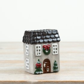 Charming candle house in grey and red with a glossy glaze finish.