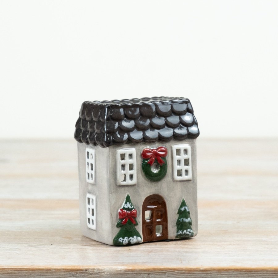 Charming candle house in grey and red with a glossy glaze finish.