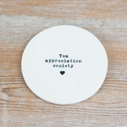 Elegant white ceramic coaster for tea enjoyment