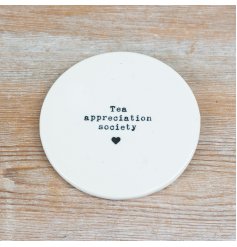 Elegant white ceramic coaster for tea enjoyment