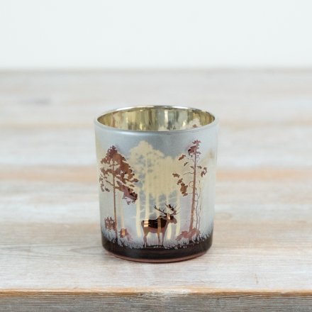 Bring a sense of woodland calm to seasonal interiors with this Frosted Forest T-light Holder.