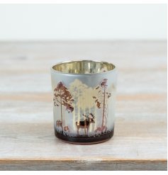 Bring a sense of woodland calm to seasonal interiors with this Frosted Forest T-light Holder.