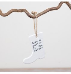 a fun hanging boot decoration finished with a rustic jute hanging loop for easy display.