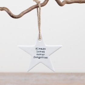 White ceramic star hanger engraved with “Always loved, never forgotten” 