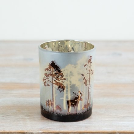 Designed in frosted glass, the piece showcases a beautifully illustrated woodland scene