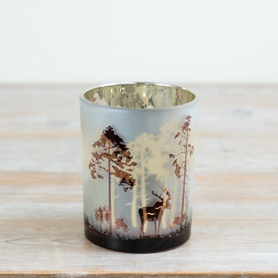 Crafted in frosted glass, this piece features a stunning woodland illustration.