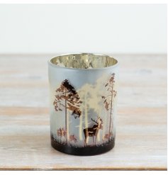 Designed in frosted glass, the piece showcases a beautifully illustrated woodland scene