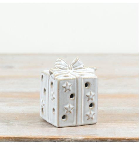 Delightful glowing gift box ornament with lights.