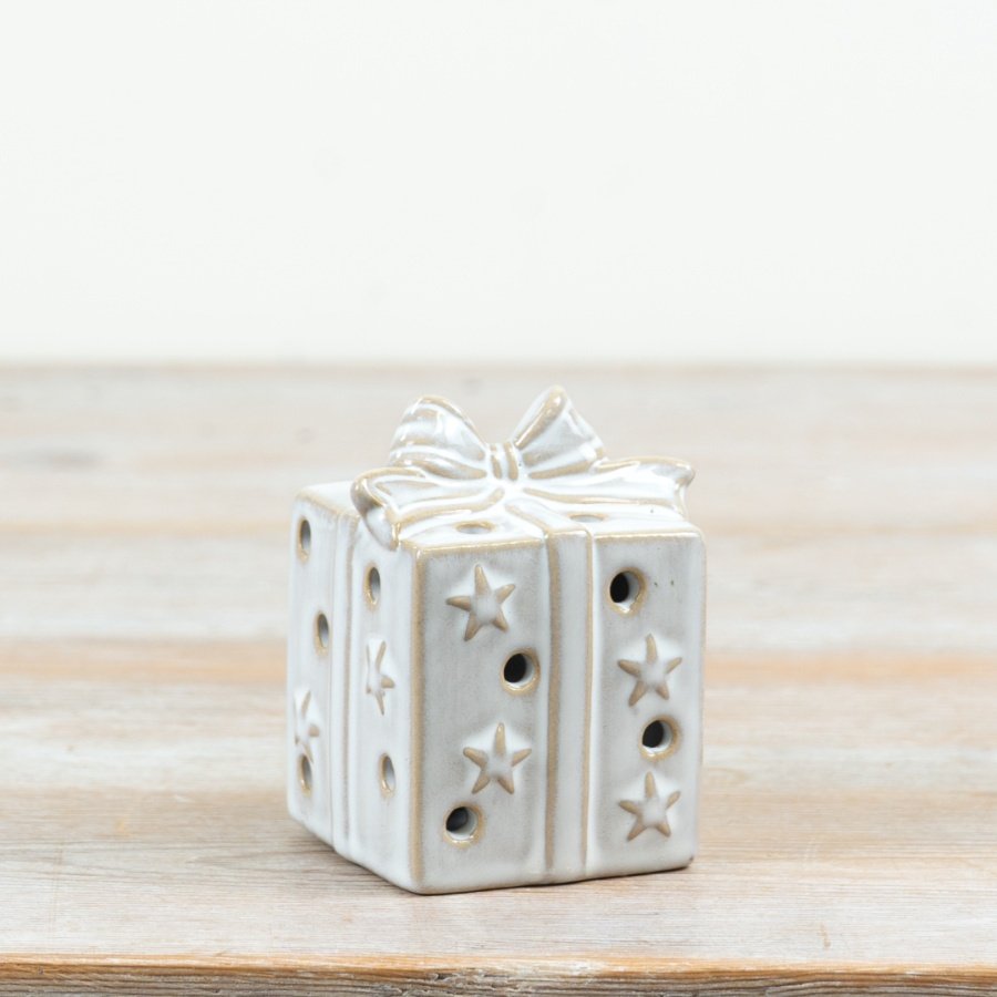 Delightful glowing gift box ornament perfect for festive décor.