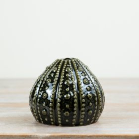 Bring coastal vibes with this 10 cm dark green porcelain Sea Urchin Vase for your space.