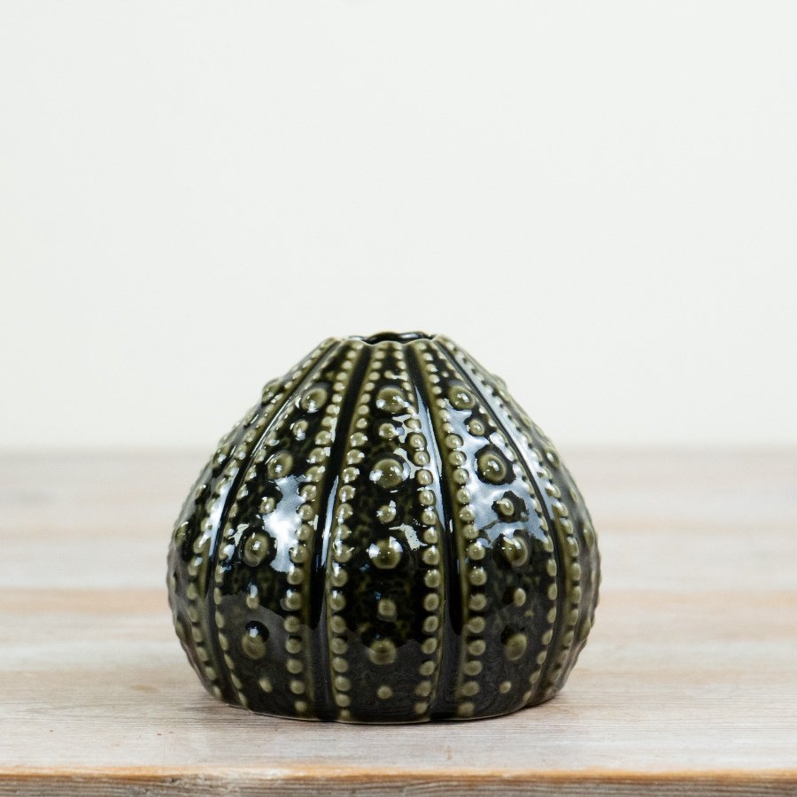 Bring coastal vibes with this 10 cm dark green porcelain Sea Urchin Vase for your space.