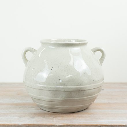 Add timeless farmhouse charm to your collection with this large, neutral ceramic vase