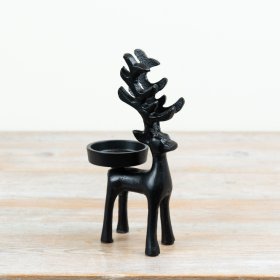 Black standing candle holder for elegant display and décor.