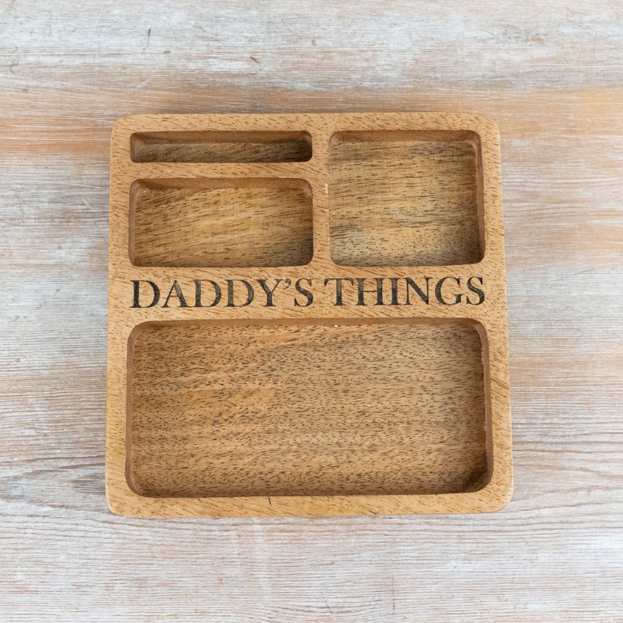 Crafted from natural mango wood, the design features multiple compartments 