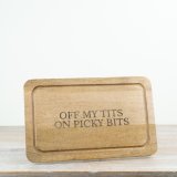 Handcrafted wooden serving board with a charming rustic look.