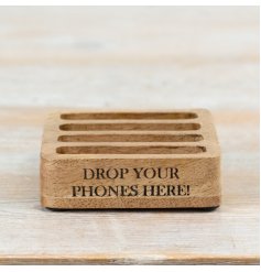 Stylish wooden phone holder with a sleek design.