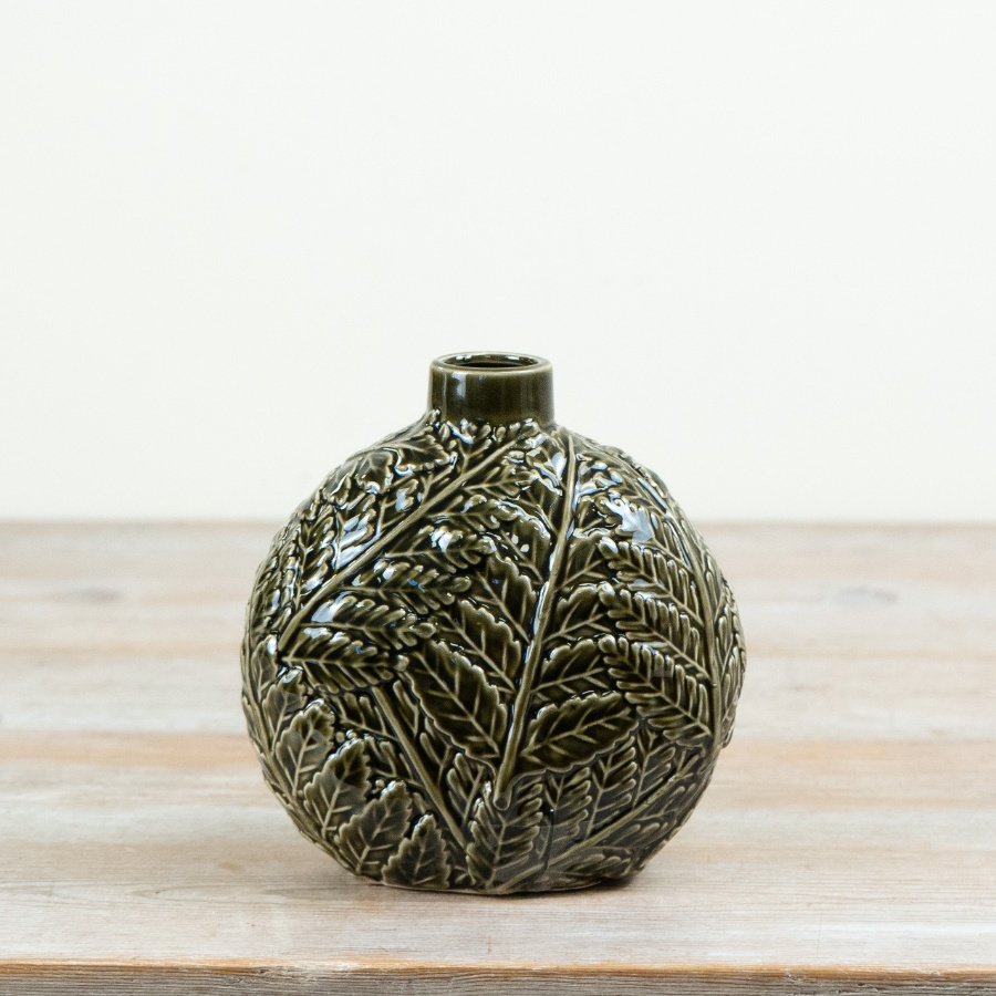 Elegant vase featuring a beautiful glazed leaf pattern.