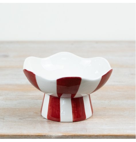 Bring holiday joy with our Red & White Striped Candy Bowl, perfect for festive treats!