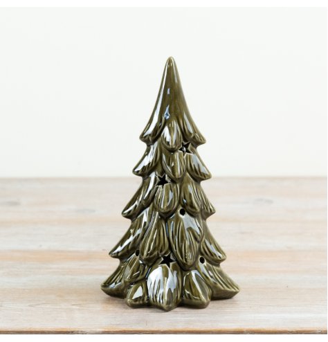 Styled as a fir tree silhouette, this decorative item showcases layered branches with a rich glossy finish.