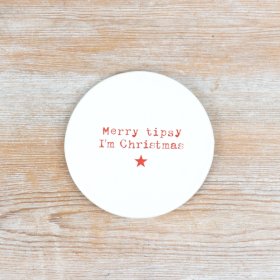 Festive round coaster, perfect for adding charm to your holiday celebrations.