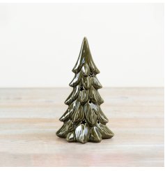 Bring holiday cheer with this stylish LED ceramic Christmas tree that emits a cosy festive light.