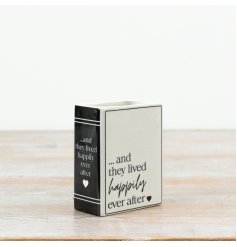 This ceramic book-shaped vase is finished in a crisp monochrome palette 