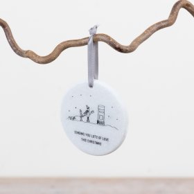 Add a meaningful touch to festive décor with this elegant marble hanging decoration.