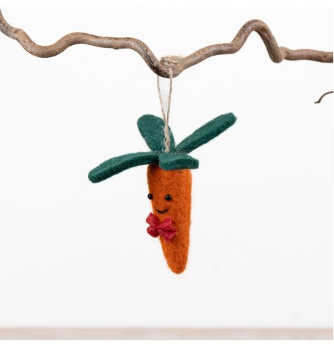Bring holiday cheer with this cute Christmas Carrot Hanging Decor for your home.