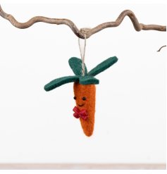 Bring holiday cheer to your space with this delightful Christmas Carrot hanging ornament.
