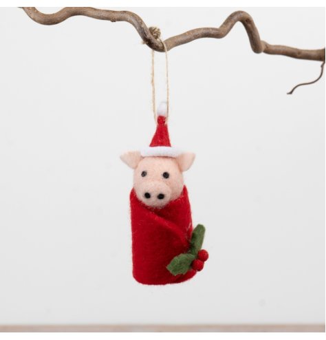 Bring holiday cheer with this adorable felt Christmas Pig in a Blanket decoration.