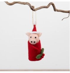 Bring holiday cheer with this adorable felt Christmas Pig in Blanket decoration.