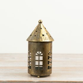 Illuminate your space with the warm charm of this elegant gold candle holder.