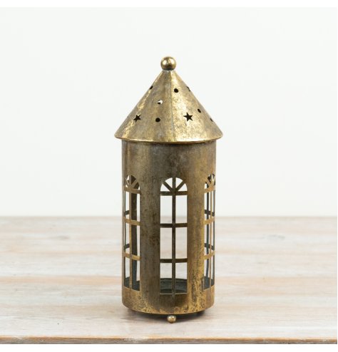 Elevate your decor with this elegant Gold Metal House Candle Holder for a chic home touch.
