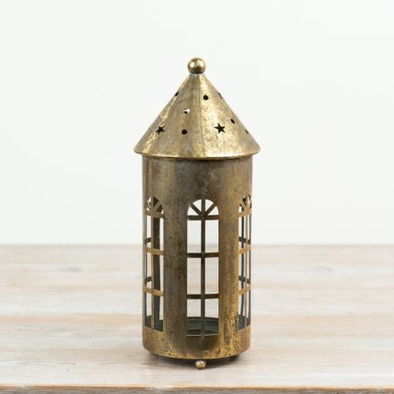 Elevate your decor with this elegant Gold Metal House Candle Holder for a chic home touch.