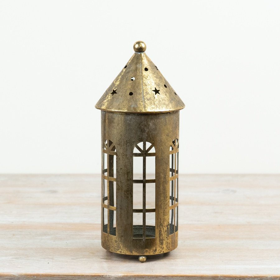 Elevate your decor with this elegant gold metal house-shaped candle holder.