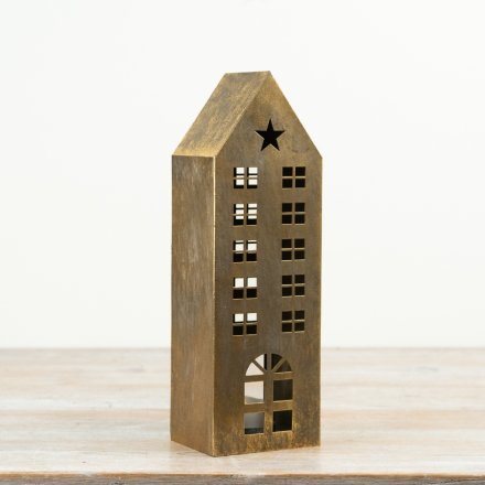 This 31cm metal house lantern features a brushed gold finish with star and window cut-out detailing.