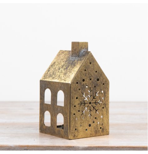Add warmth to your collection with this distressed antique-style metal house t-light holder.