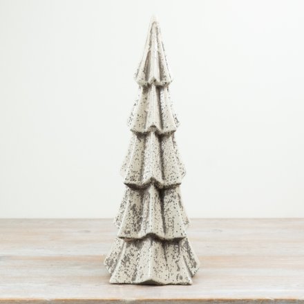 With its monochrome speckled finish and bold tiered design