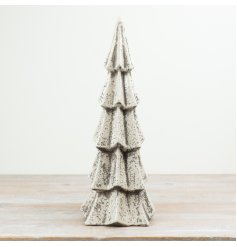 With its monochrome speckled finish and bold tiered design