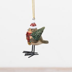 Endearing robin donning Santa hat and holding a Christmas tree, ideal for festive décor