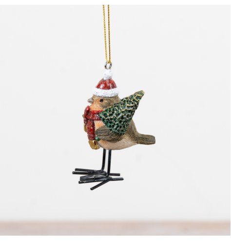 Endearing robin donning a Santa hat clutching a Christmas tree, ideal for holiday décor