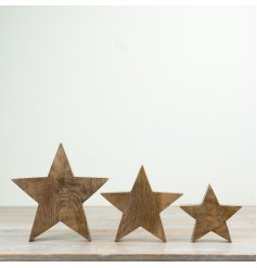 Introduce natural warmth and timeless styling to your range with this set of 3 mango wood stars.