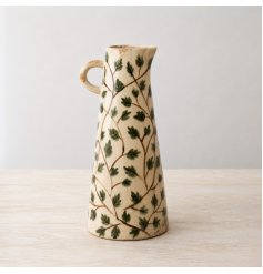 a stunning leaf design vase in the shape of a jug 