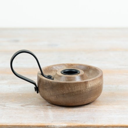 Add a touch of rustic charm and warmth to any room with this elegant candle stand