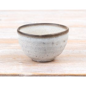 Bring rustic charm to your home with this handmade Rustic Speckle Bowl.