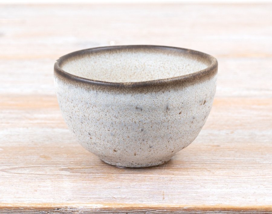 Bring rustic charm to your home with this handmade Rustic Speckle Bowl.