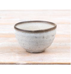 Add a touch of rustic charm with this handcrafted Rustic Speckle Bowl,
