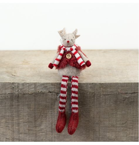 Add festive cheer to your decor with this charming, playful mouse shelf sitter.