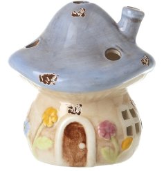 Add a touch of charm with this Blue Floral Ceramic Mushroom House