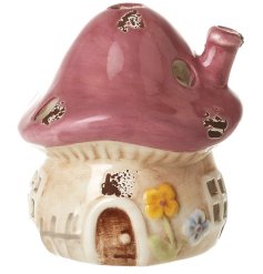 Add a whimsical touch to your space with this Pink Ceramic Mushroom House